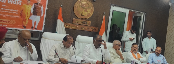 UP minister Girish Chandra Yadav speaking to mediapersons