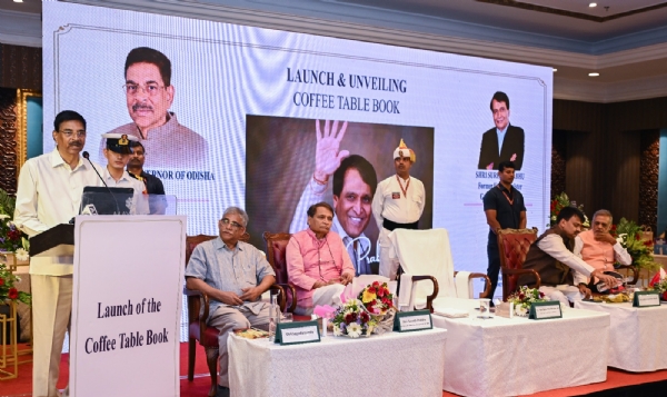 Governor Launches Coffee Table Book on Suresh Prabhu