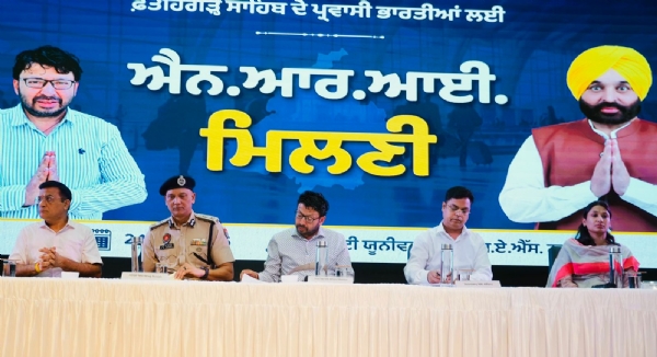 Minister Dr. Ravjot Singh listing complaints of NRI during NRI Milni