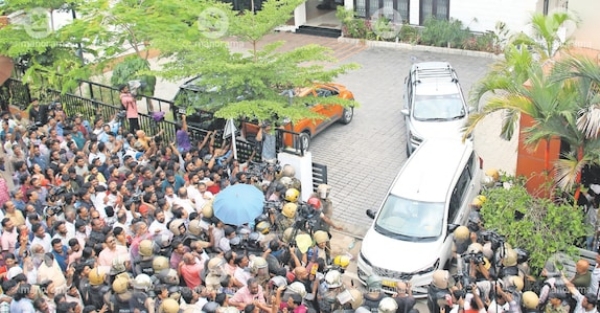 CPM workers surrounding ED officers vehicle