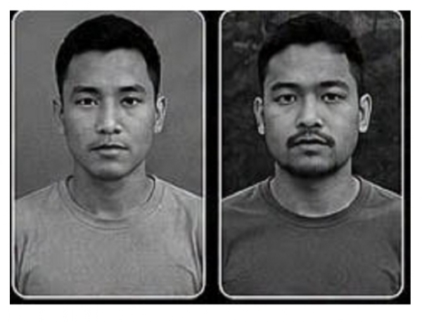 Photo Caption: Suspected ULFA-I cadres arrested by Assam Police at Jagun in Tinsukia district  with the recovered AK-56 rifles, grenades and ammunition.