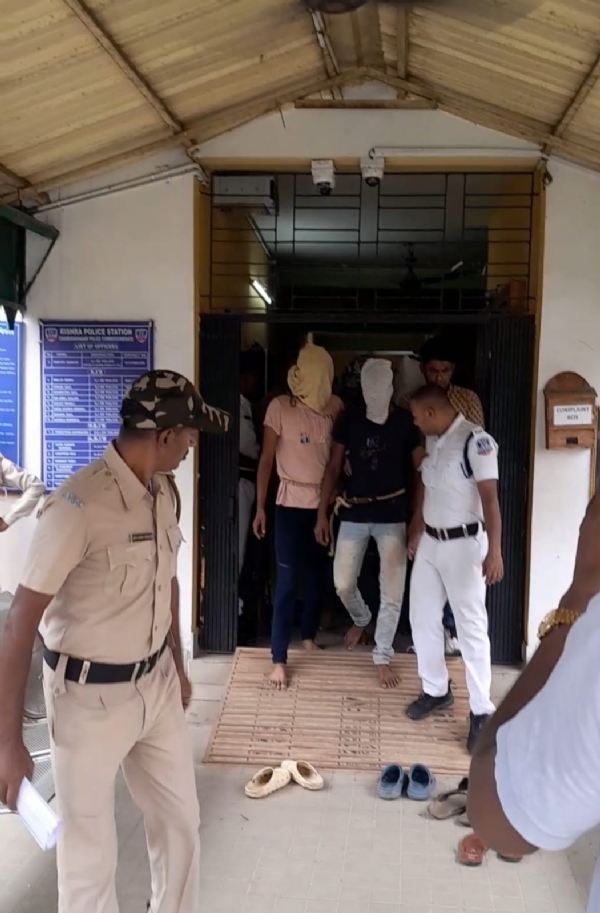 The accused with police
