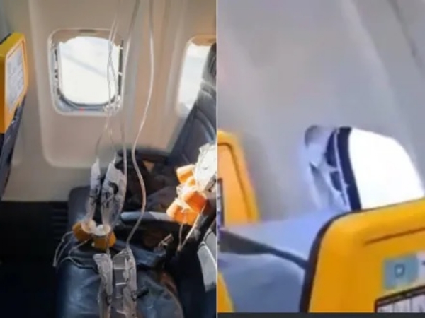 The damaged window of a Ryanair Boeing 737 aircraft.