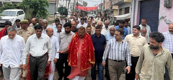 MLA Vijaypur, Chander Parkash Ganga along with others after starting development works in Bari Brahmana