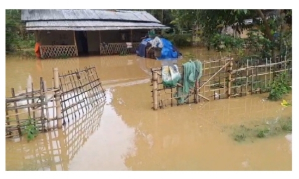 Caption: Floodwaters inundate villages after the breach of the Puthi River ring embankment in the Balma area of Teok in Jorhat district. Caption: Floodwaters inundate villages after the breach of the Puthi River ring embankment in the Balma area of Teok in Jorhat district.