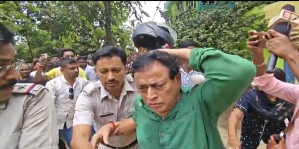Arambagh Panchayat Samiti President Shishir Sarkar arrested; protesters pelt him with eggs during arrest