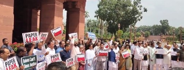 Congress-led bloc protests in Parliament, demands Dharmendra Pradhan’s resignation. Congress-led bloc protests in Parliament, demands Dharmendra Pradhan’s resignation.