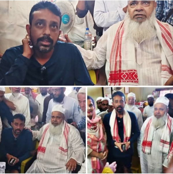 ऊपरी असम में बाढ़ पीड़ितों के बीच बदरुद्दीन अजमल के साथ शृंखल चलिहा।