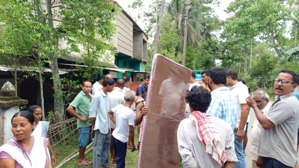 Image of the RSS, Seva Bharati Rescue and Relief Operations in Flood-Hit Upper Assam.