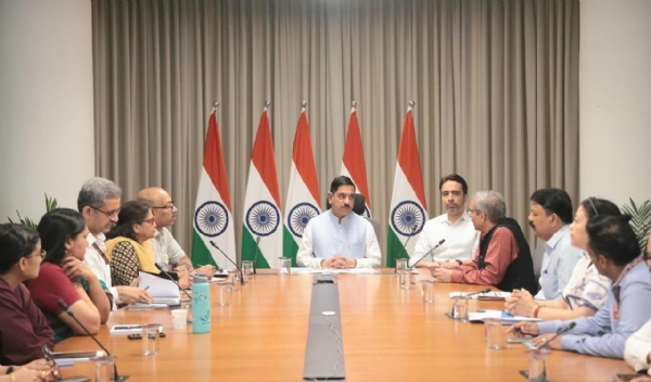 Union Education Minister Pralhad Joshi chairs a meeting with officials on Sunday.