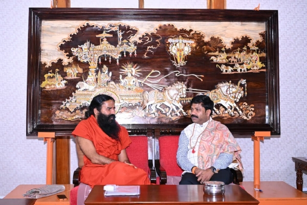 Minister Nandi meeting Baba Ramdev at Patanjali Yogpeeth in Haridwar
