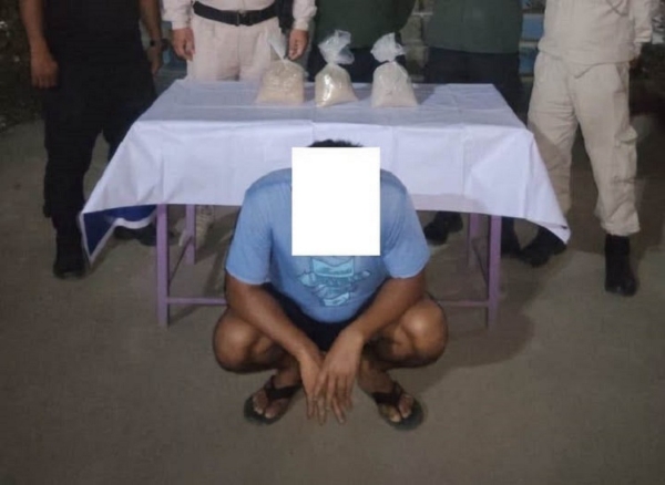Image of the Arrested Accused with Brown Sugar Worth 2.5 kg.