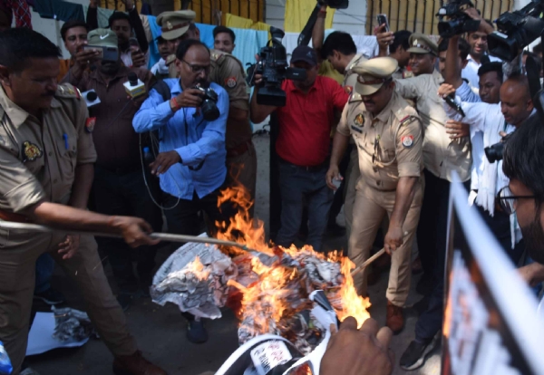Youth Congress and NSUI workers staged a protest at the Congress headquarters by burning an effigy of Union Education Minister Dharmendra Pradhan over the alleged NEET examination paper leak.