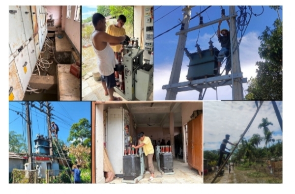 Images of the APDCL Staffs Restoring Power in Flood-Hit Areas.