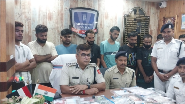 DCP Arnab Biswas and other officers during the press conference
