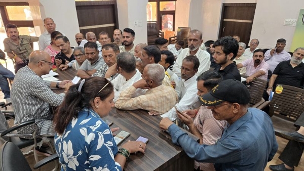 MLA Jammu East, Yudhvir Sethi listening public grievances at Janta Darbar at Kachi Chawni