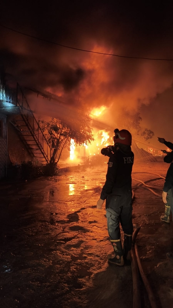 Firefighters battling the blaze.