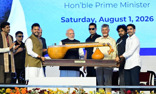 PM receives Bobbili Ekanda Veena during Bhogapuram airport inauguration