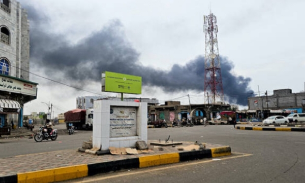Smoke rises during a Houthi attack on the Red Sea port city of Al Mokha in Yemen.