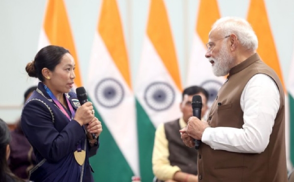 PM Narendra Modi with Mirabai Chanu PM Narendra Modi with Mirabai Chanu