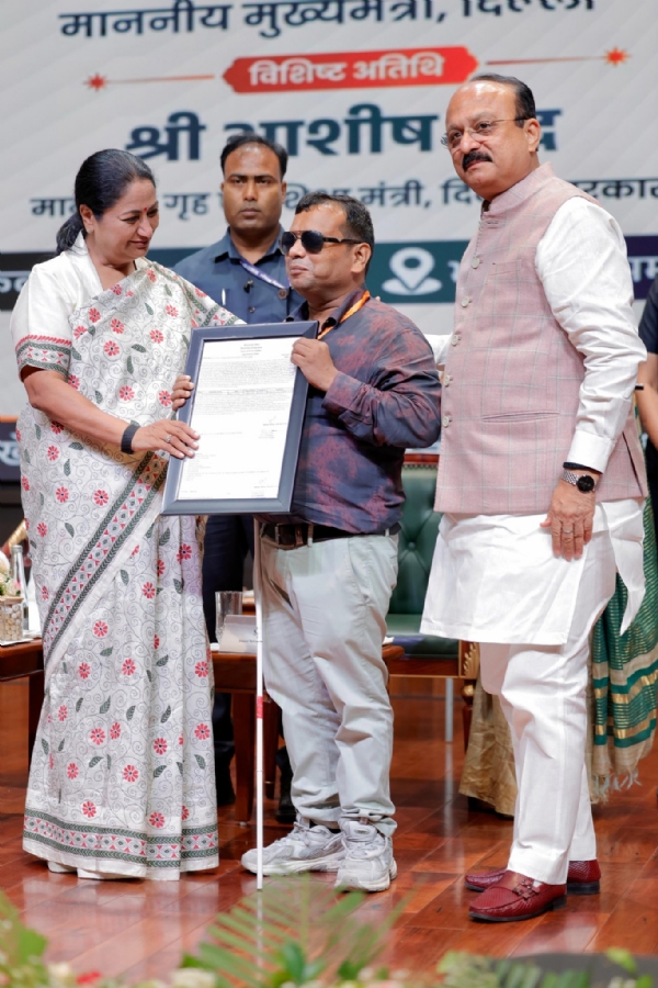 Chief Minister Rekha Gupta distributing appointment letters to 1,368 newly appointed teachers at a ceremony held at Bharat Mandapam on Thursday.