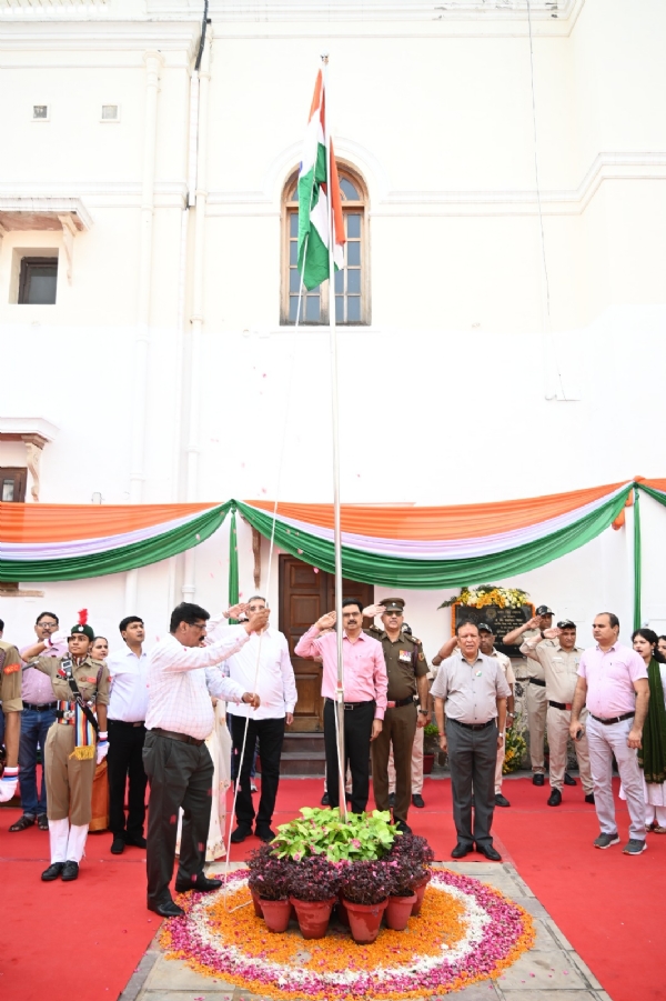 Delhi University Vice-Chancellor Prof. Yogesh Singh salutes the Tricolour.