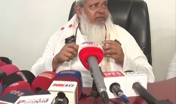Badruddin Ajmal talking to media persons.