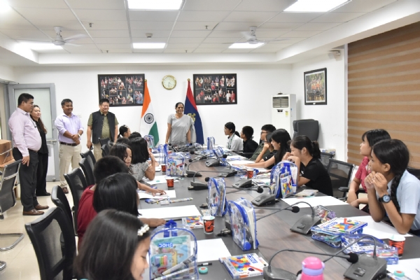 Children depict the message of “My India: Unity in Diversity” through their artwork.