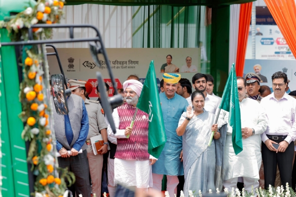 Delhi Lieutenant Governor and Chief Minister flagging off 200 electric buses, the ‘Ladies Special Bus Service’, and the Delhi-Karnal route.