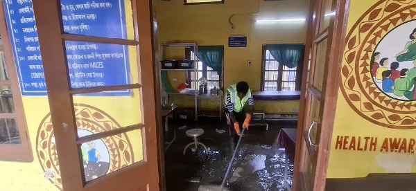 Image of the Health Centre cleaning after flood. Image of the Health Centre cleaning after flood.