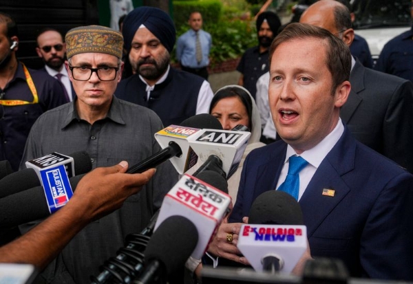 US Ambassador to India Sergio Gor speaks to the media as he arrives at the residence of Jammu and Kashmir Chief Minister Omar Abdullah, in Srinagar.