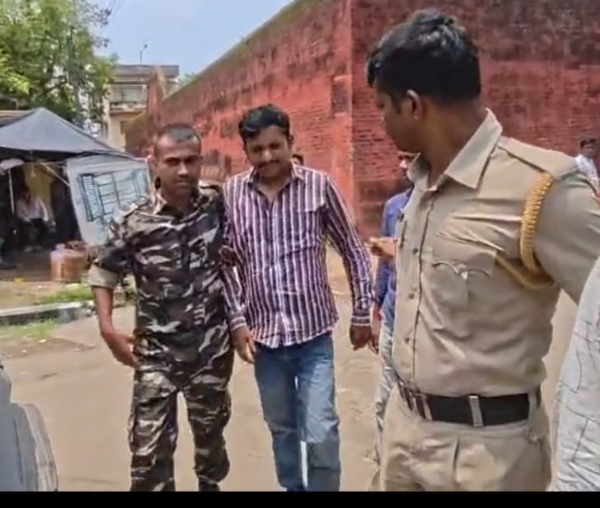 The accused with the police
