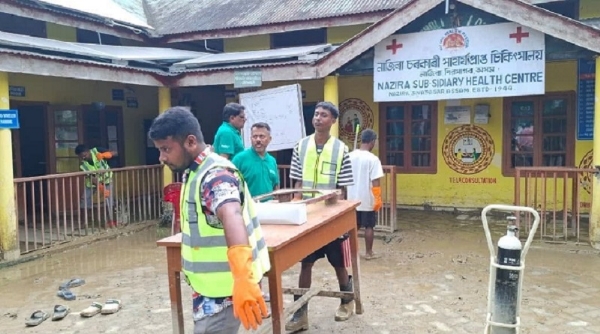 Assam flood: Cleaning oh health Centre. Assam flood: Cleaning oh health Centre.
