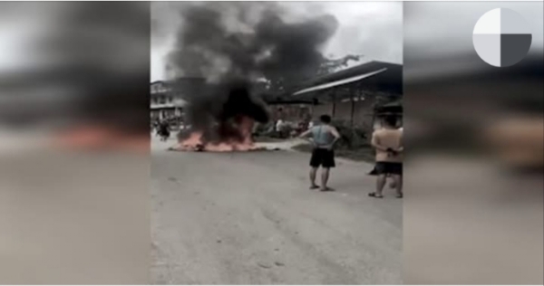 Image of the house burning in Manipur.