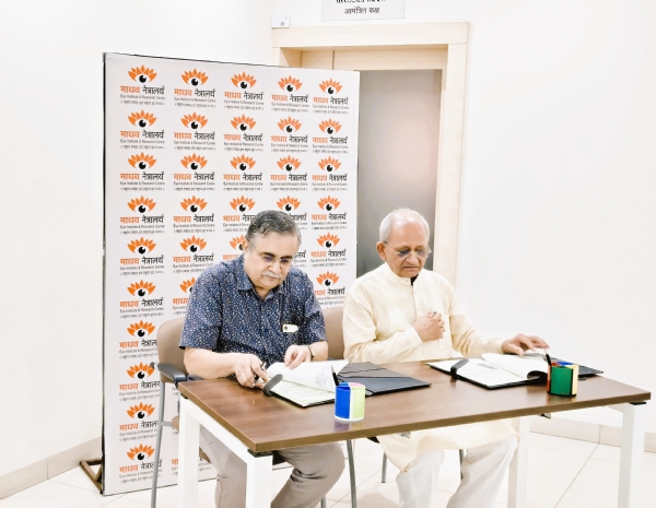 Arvind Mardikar and Avinash Agnihotri signing the agreement. Arvind Mardikar and Avinash Agnihotri signing the agreement.