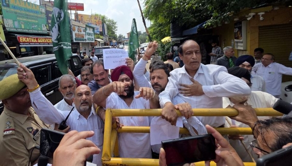 Power tariff hike continues to invite criticism, protests Power tariff hike continues to invite criticism, protests