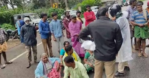 Local people led by CPM block highway Local people led by CPM block highway