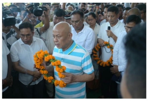 BTC Chief Hagrama Mahilari Paying Floral Tribute to BTC Deputy Speaker Bijit Gaura Narzary.