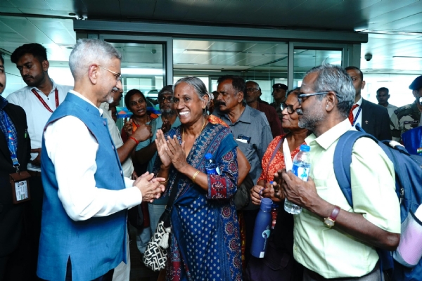 External Affairs Minister S. Jaishankar meets tourists from Tamil Nadu at New Delhi airport.