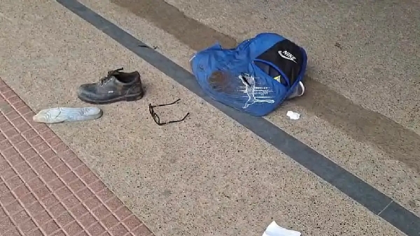 The victim’s bag, spectacles and shoes The victim’s bag, spectacles and shoes