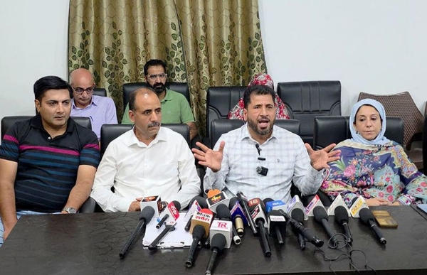 Members of JKEEGA during a press conference in Srinagar
