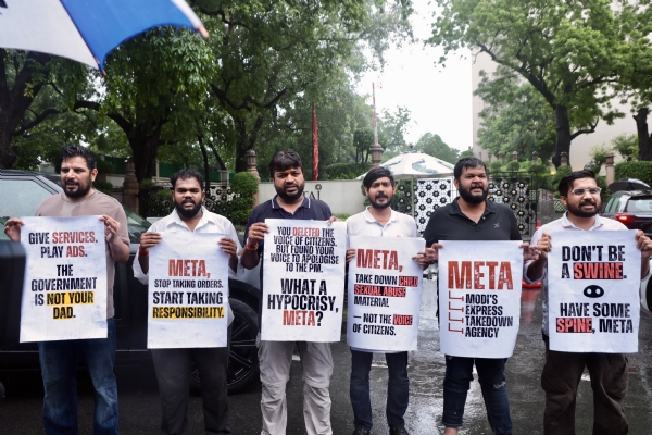 Indian Youth Congress (IYC) workers protesting against Meta outside Taj Hotel in New Delhi on Thursday.
