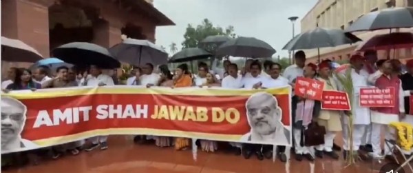 Opposition MPs protesting and raising slogans inside the Parliament premises on Thursday against the alleged theft of donations at the Ayodhya Ram Temple and the reported police action against students.