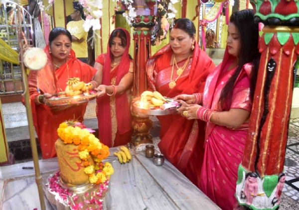 Women performing puja with devotion and faith at Samaya Mata Temple