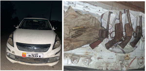 Four pistols seized from an Indian-registered vehicle