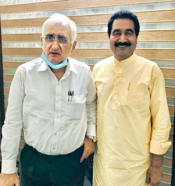 Former Union Minister Salman Khurshid with  President of the City Congress Committee Fuzail Hashmi