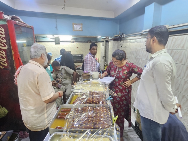 The officers at a sweet meat shop