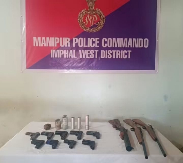 Image of the Nine 9mm Pistols and Grenade Recovered in Imphal West.