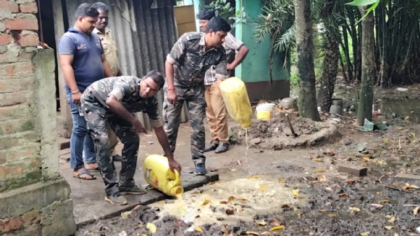 Police destroying illegal liquor