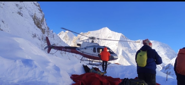The helicopter carries out rescue operations in the high-altitude Himalayan region.